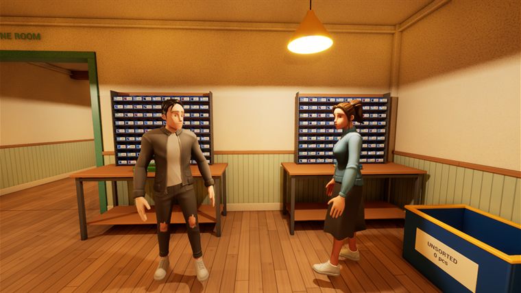 Two shop workers chatting by the packing benches