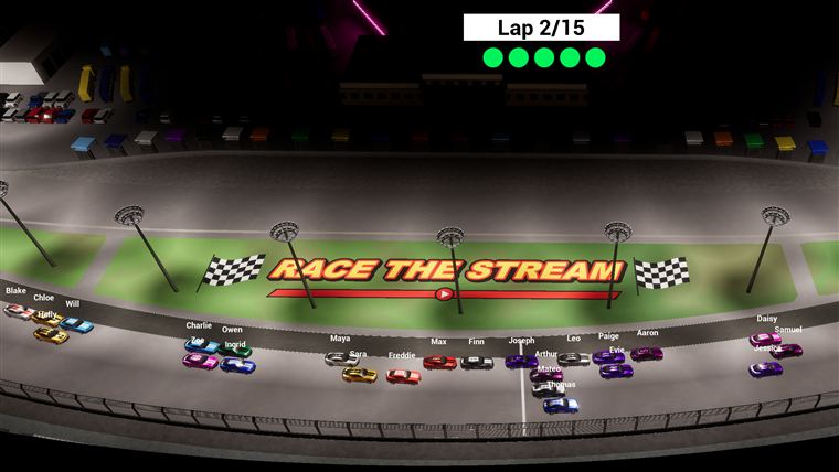The pack on the floodlit front stretch at night, with the Race The Stream logo on the infield